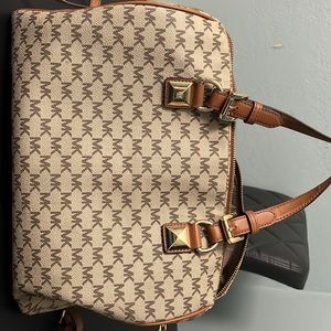 original used Michael Kors. Check picture for bag details.